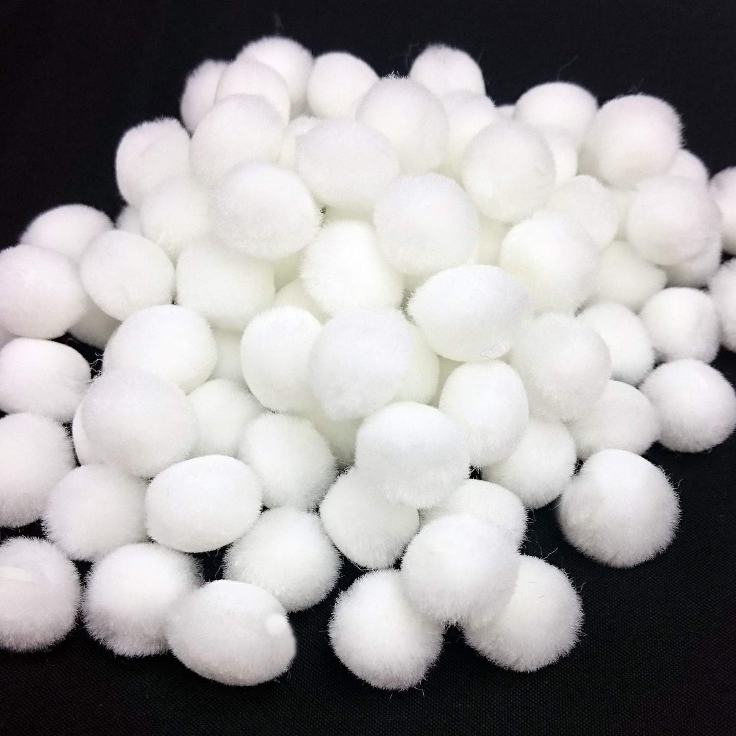 Pompons de couleurs unies